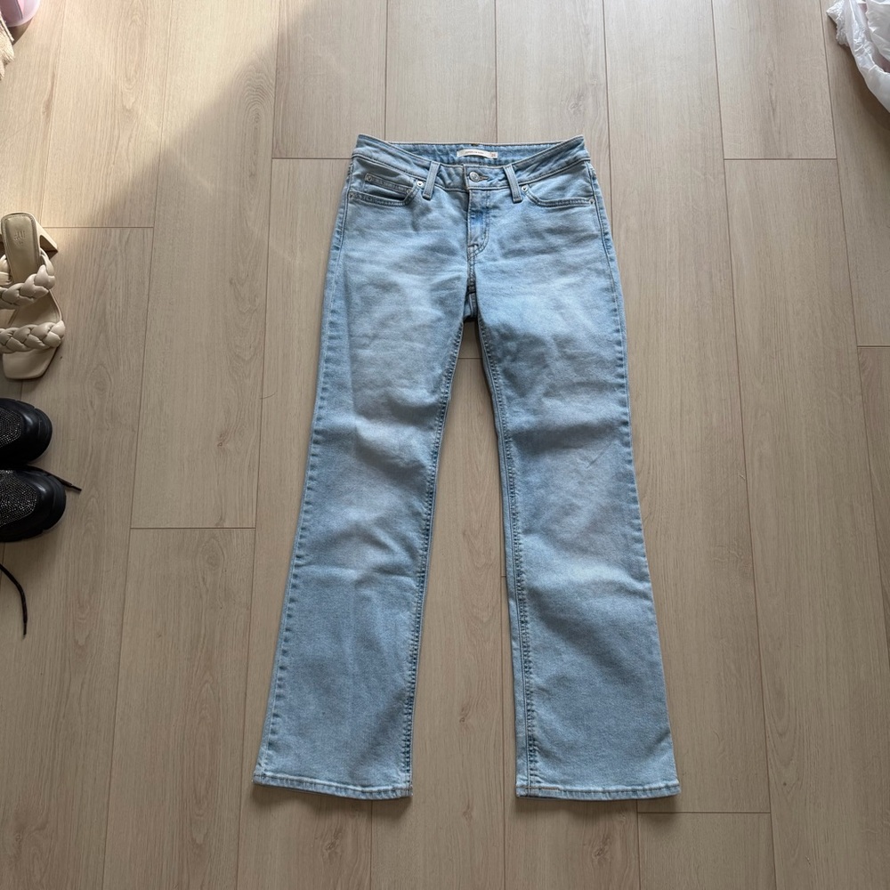Levi’s bootcut jeans worn